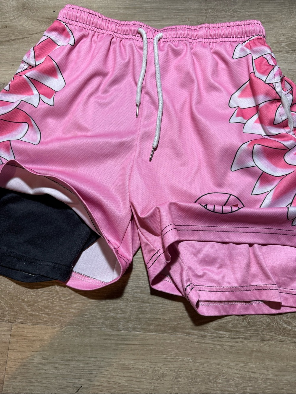 Pink Athletic Shorts with Floral Accent